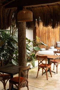 Restaurant o un lloc per menjar a AGAM Hotel Boutique Bacalar - Adults Only
