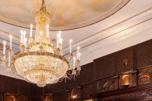 a large chandelier hanging from a ceiling at St Helens Hotel, Dublin in Stillorgan