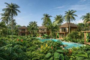 an image of a resort with a pool and palm trees at Kappa Senses Zanzibar in Pwani Mchangani
