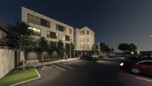a rendering of a building with cars parked in a parking lot at Yugo Explore - Melbourn Point in Cork
