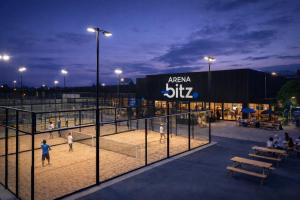 a rendering of an arena with people playing baseball at Arena Bitz in Pato Branco