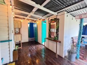 a room with colorful walls and wooden floors at The Bocas Corner in Bocas Town