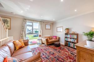 a living room with a couch and a book shelf at 2 Bed in Shoreham-by-Sea oc-b29920 in Shoreham-by-Sea