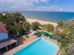 an overhead view of a swimming pool and the beach at Sunbird Waterfront in Salima