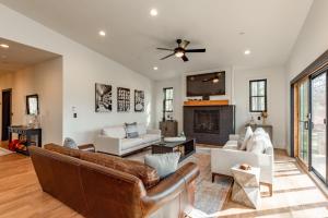 a living room with a couch and a fireplace at Bourbon Sunset by Railey Vacations in Swanton