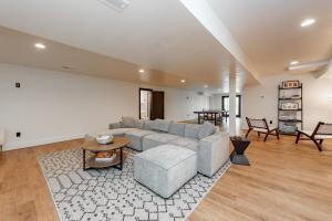 a living room with a couch and a table at Bourbon Sunset by Railey Vacations in Swanton +35 photos