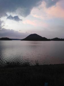 a view of a large body of water at Lake parth Giritale in Giritale