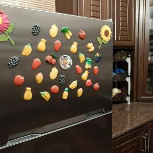 a refrigerator with many different types of fruit on it at المناره هاوس in Wadi Musa +5 photos