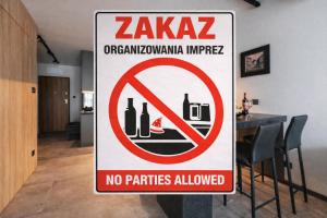 a sign in a room that says no parties allowed at PLATiNiUM RESiDENCE GARDEN SASKI - "CENTRUM" in Lublin