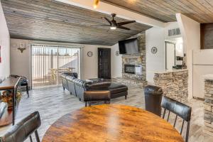 a living room with a table and chairs and a couch at 1 Mi to Main St Eats! Single-Level Red Bluff Home in Red Bluff