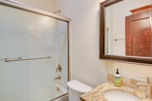 a bathroom with a toilet and a sink and a shower at Epic Silver Valley Basecamp: Steps to Dtwn Fun! in Wallace +16 photos