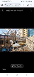 a picture of a balcony with a table and chairs at 31Mesrop Mashtots Avenu in Yerevan +11 photos