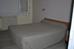 Postel nebo postele na pokoji v ubytování Le Logis Charmant