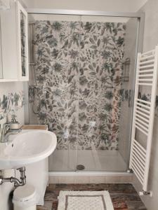 a bathroom with a shower and a sink at B&B SunBeach in San Benedetto del Tronto +19 photos