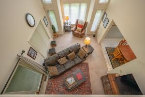 an overhead view of a living room with a couch at Cabin & Canoe by Railey Vacations in McHenry +55 photos