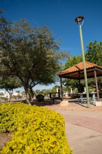 a park with a pavilion and a light pole at Loft Montecarlo in Hermosillo