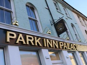 a park entrance sign on the front of a building at Park Inn Palace in Dover