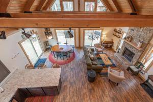 an overhead view of a living room with a fireplace at Lighthearted Lodge by Railey Vacations in Swanton