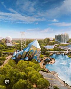an aerial view of a water park with a roller coaster at Oasis proche du Futuroscope in Saint-Cyr