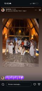 a group of people posing for a picture on a website at AMAY in Asia