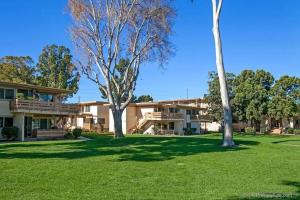 a house with two trees in the yard at Luxury Condo Resort Amenities - Pool, Pickleball in San Diego