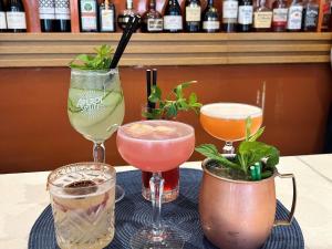 a group of drinks on a table at Novotel Newcastle Beach in Newcastle +155 photos