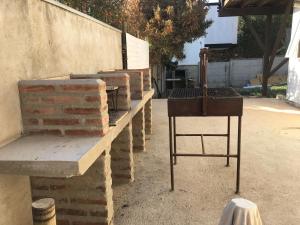 a group of bricks sitting next to a wall at Cabañas en Algarrobo Norte in Algarrobo