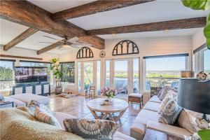 a living room with a couch and a table at Panoramic view in San Marcos