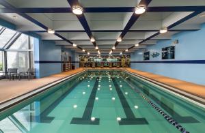 an indoor swimming pool with green lanes at Hyatt Regency Boston in Boston