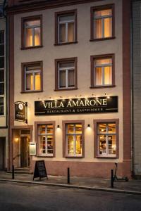 a building with a sign that reads villa amagine at Villa Amarone in Mannheim