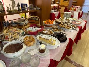 a table with a buffet of food on it at Albergo Seggiovia in Scanno