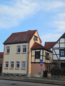 a building on the side of a street at Ferienhaus An der Burg in Oschersleben +9 photos