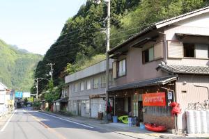 a building on the side of a street at RIVIERA Iya Valley in Akano