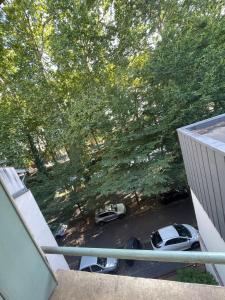 a view of two cars parked in a parking lot at All in relaxation in Toulouse