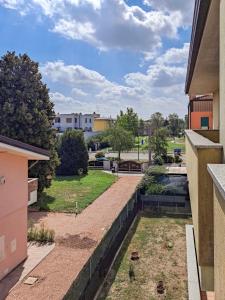a view of a garden from a building at Appartamento Roverella in Rovigo