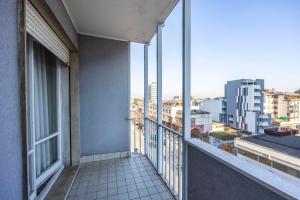 a balcony with a view of a city at Italian Experience-Mestrina Apartment in Mestre