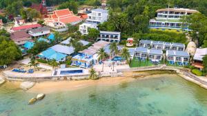 an aerial view of a resort on a beach at Three Trees Samui Resort - Sarocha Villa in Lamai
