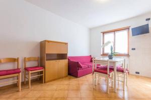 Posezení v ubytování Comano Terme Apart