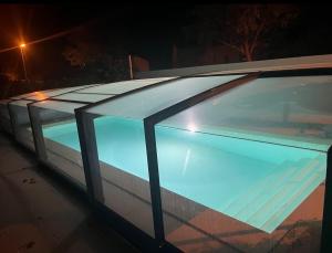 a glass roof of a car at night at Le Clos des Galets in Meynes