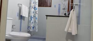a bathroom with a toilet and a sink and a shower at bansri villa in Mount Lavinia