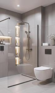 a bathroom with a glass shower and a toilet at FourSeasons - Carnival Summer Lounge in Aalborg