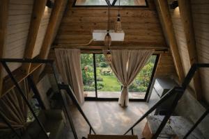 an overhead view of a room with a large window at Casa Cayena - Hibiscus House in El Valle