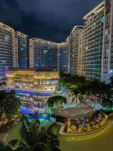 a view of a large building at night at Casa Del Sol in Manila