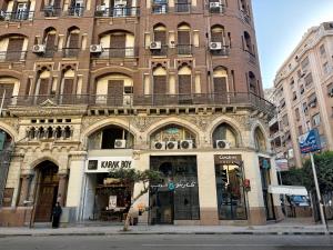 a building on a street in front of a building at Boutique Residence Layal-Lemon Spaces Downtown in Cairo