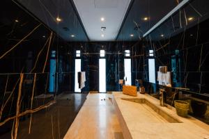 a dressing room with a table and a mirror at Villa Dar E'Zwinna in Marrakesh +69 photos