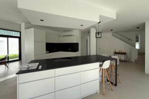 a kitchen with white cabinets and a black counter top at Casablanca-Private Family Mountain Home in El Amunt