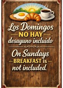a sign with a breakfast of eggs and a cup of coffee at Nely y Pietro share apartment in Punta Cana
