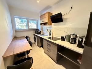 a kitchen with a counter top and a sink at Business Apartment City 5 Betten & Parkplatz in Lüdenscheid