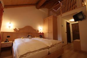 Postel nebo postele na pokoji v ubytování Hotel Fonte Dei Veli