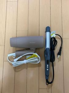 a blow dryer and a hair dryer with a cord at Nagi Takamatsu 702 in Takamatsu